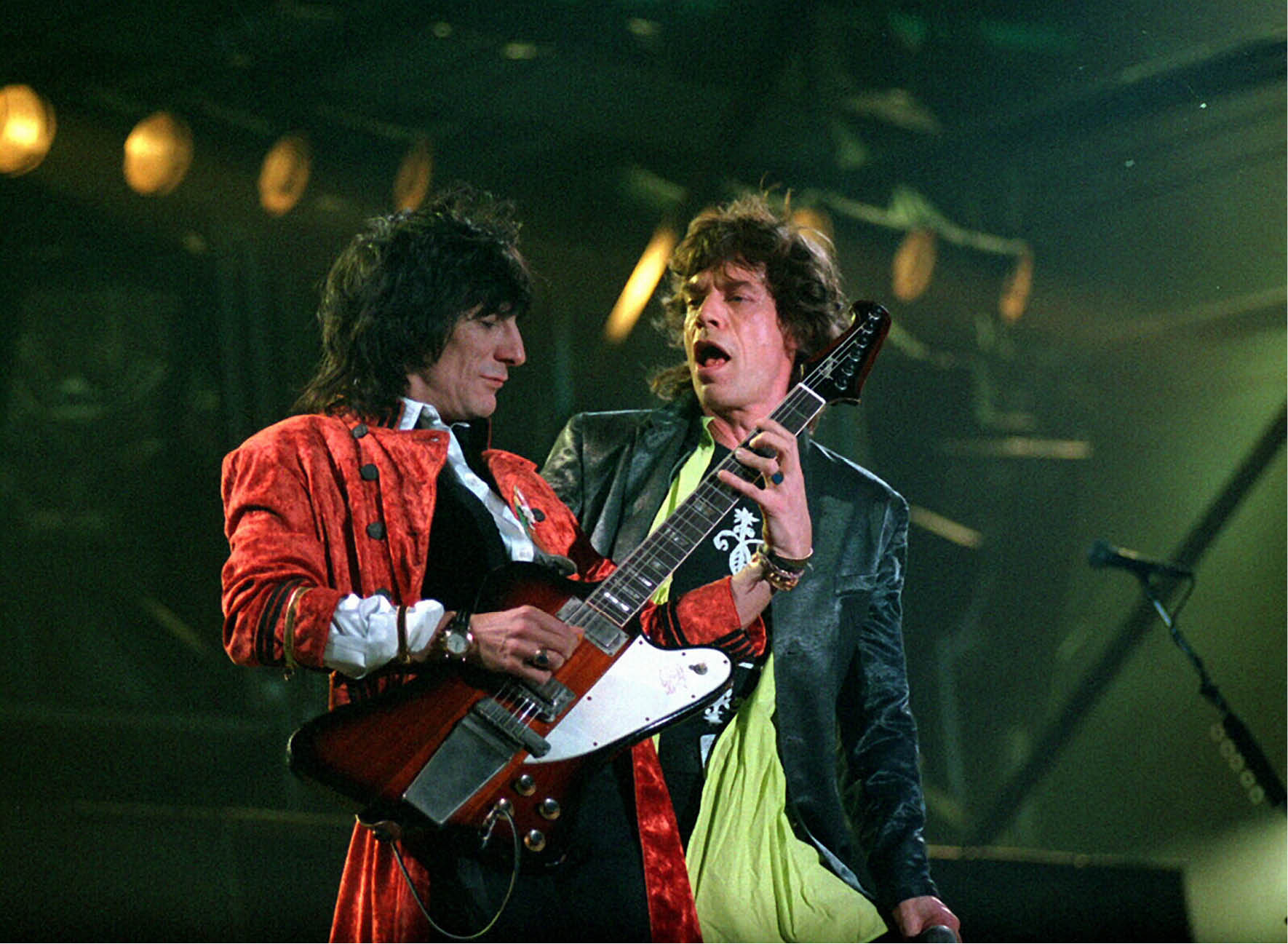 Mandatory Credit: Photo by Roy Haverkamp/Newspix / Rex Features ( 874066a ) The Rolling Stones - Ronnie Wood and Mick Jagger The Rolling Stones in concert during Australian leg of Voodoo lounge tour, Sydney Cricket Ground, Sydney, Australia - 02 Apr 1995