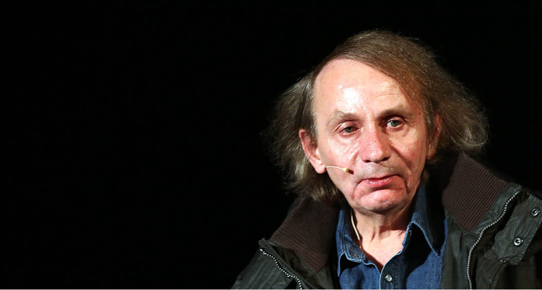 epa04569675 French author Michel Houellebecq looks on during the presentation of his new novel 'Soumission (Submission)' in Cologne (North Rhine-Westphalia), Germany, 19 January 2015.  EPA/OLIVER BERG