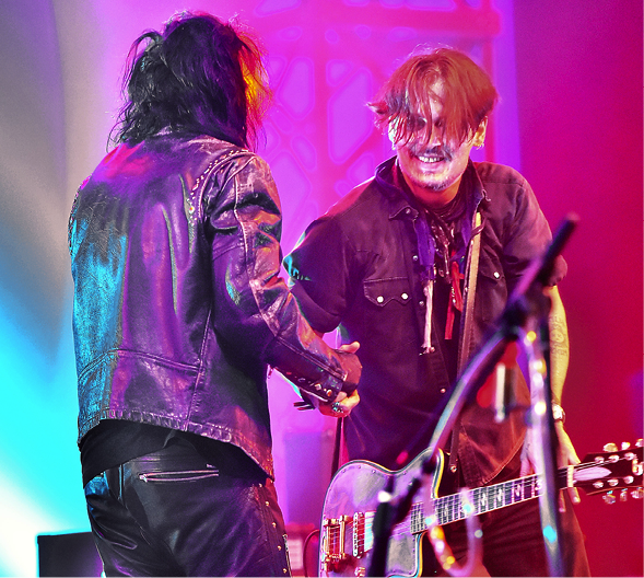 Johnny Depp rocked the house during a performance at a private charity show with Alice Cooper over the weekend. The show was held at the auditorium of Servite Catholic High School in Anaheim, CA on Saturday night. The actor and the rock legend performed a few hits, including the song 'Come Together'. The charity show was held for guests who attended the 'NAMM' music convention held in Anaheim. Johnny's fiancé Amber Heard was also spotted arriving with a friend to watch the show.  Pictured: Johnny Depp and Alice Cooper Ref: SPL936527  270115   Picture by: Fern/Sharpshooter Images  Splash News and Pictures Los Angeles:310-821-2666 New York:212-619-2666 London:870-934-2666 photodesk@splashnews.com