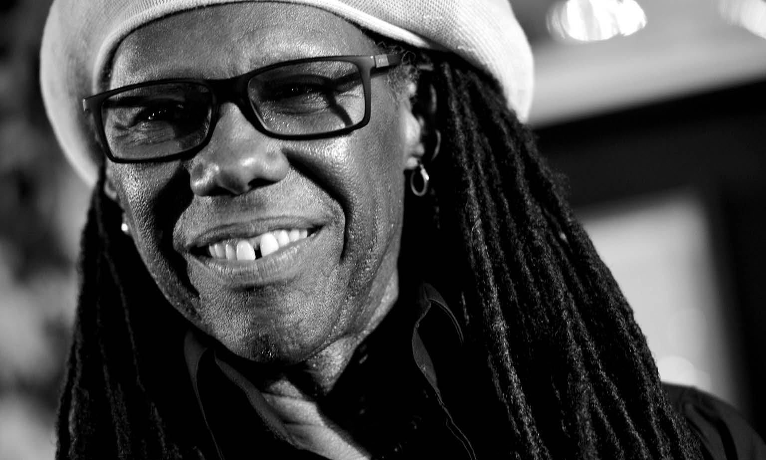BURBANK, CA - MARCH 13: (EDITORS NOTE: Image was shot in black and white. Color version not available.) Musician Nile Rodgers appears onstage for a Q&A and to perform at a "Disco Party" at Warner Brothers Records on March 13, 2015 in Burbank, California.   Kevin Winter, Image: 226757834, License: Rights-managed, Restrictions: (EDITORS NOTE: Image was shot in black and white. Color version not available.), Model Release: no, Credit line: Profimedia, AFP
