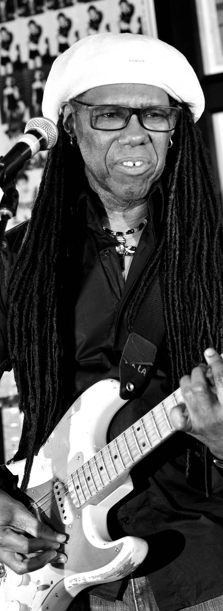 BURBANK, CA - MARCH 13: (EDITORS NOTE: Image was shot in black and white. Color version not available.) Musician Nile Rodgers appears onstage for a Q&A and to perform at a "Disco Party" at Warner Brothers Records on March 13, 2015 in Burbank, California.   Kevin Winter, Image: 226757433, License: Rights-managed, Restrictions: (EDITORS NOTE: Image was shot in black and white. Color version not available.), Model Release: no, Credit line: Profimedia, AFP